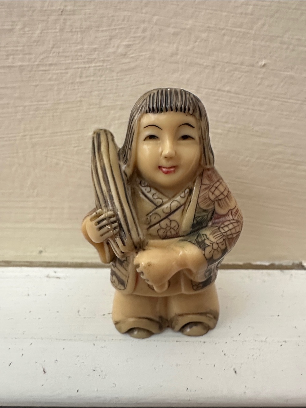 Vintage Hand Carved Woman Holding an Umbrella Figurine